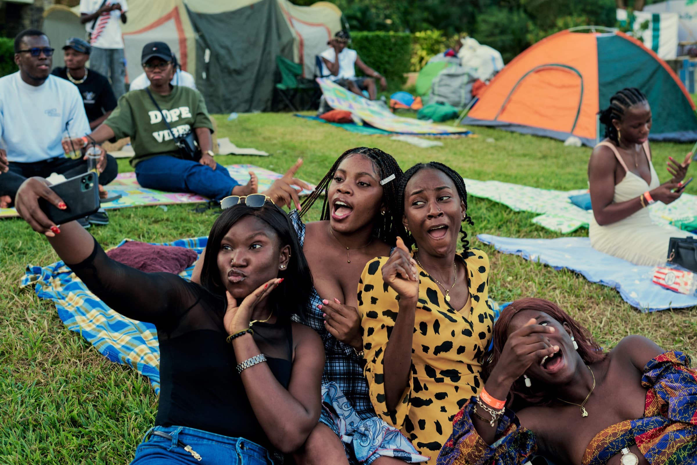 Group selfie on picnic blankets
